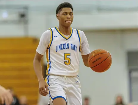  ?? For the Pittsburgh Post-Gazette ?? Lincoln Park’s Meleek Thomas drives against Laurel Highlands on Thursday at The Dome at CCBC in McMurray.