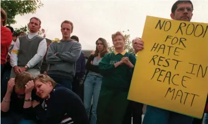  ?? ?? Friends of Matthew Shepard hold a memorial in the wake of his death. Photograph: Kevin Moloney/Getty Images