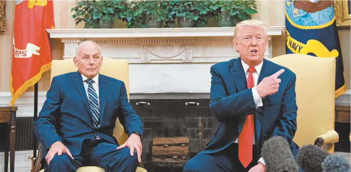  ??  ?? President Donald Trump with his newly sworn-in chief of staff, John Kelly, at the White House this week.