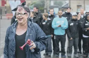  ??  ?? BEST FOOT FORWARD: Comedian Jo Brand prepares to start the Great Big Walk in Batley yesterday.