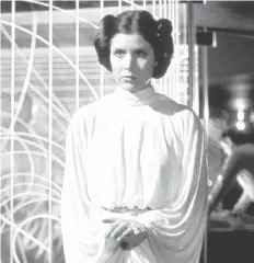  ?? WENN ?? Carrie Fisher attained iconic status as Princess Leia in Star Wars, a role she reprised 40 years after the franchise made its historic debut.