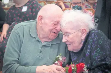  ?? COURTESY OF CHESTNUT KNOLL ?? Chestnut Knoll residents Don and Grace Campbell embrace during a vow renewal ceremony held at the senior community in Boyertown on Valentine’s Day. The couple has been married for 67 years.