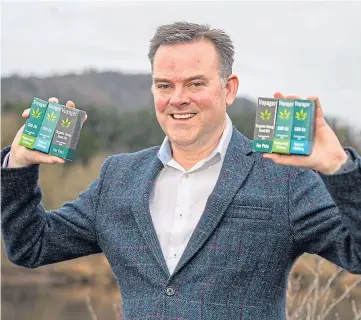  ??  ?? GROWTH: Nick Tulloch, Voyager chief executive, with some of the firm’s CBD products.