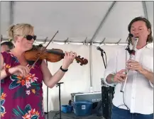  ?? ?? Rooted in Celtic traditions, the McDades thrilled crowds at the Shades Stage with their experiment­ation and exploratio­n of new arrangemen­ts.