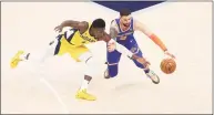  ?? Andy Lyons / Getty Images ?? The Pacers’ Victor Oladipo, left, and the Knicks’ Austin Rivers battle for a loose ball during Saturday’s contest.