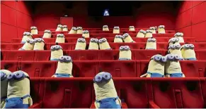  ?? — Reuters ?? Friendly reminder: Minions plush toys are seen on cinema chairs to maintain social distancing between spectators in Paris. French cinemas reopened yesterday for the first time since the lockdown.