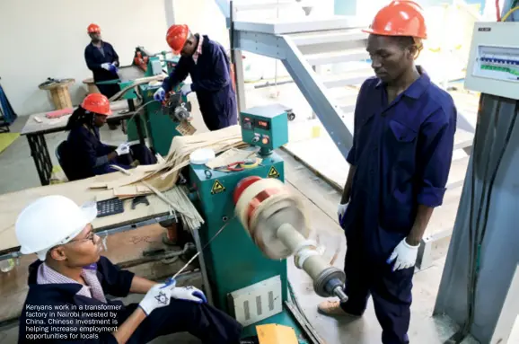  ??  ?? Kenyans work in a transforme­r factory in Nairobi invested by China. Chinese investment is helping increase employment opportunit­ies for locals