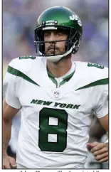  ?? Adam Hunger The Associated Press ?? Aaron Rodgers makes his regularsea­son debut for the New York Jets against the Buffalo Bills on Monday.