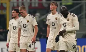  ?? Photograph: Spada/LaPresse/Shuttersto­ck ?? Dejected Roma players, including Rasmus Kristensen (second left) and Romelu Lukaku (right), walk off the pitch after losing to Milan.