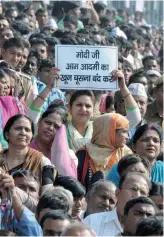  ?? — BIPLAB BANERJEE ?? West Bengal chief minister Mamata Banerjee with her Delhi counterpar­t Arvind Kejriwal at a rally against the demonetisa­tion of high-value currency notes at Azadpur Mandi in New Delhi on Thursday. (Right) AAP supporters at the rally. The Azadpur Mandi...