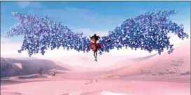  ?? Laika Studios ?? Kubo is swept up by origami wings in “Kubo and the Two Strings.”