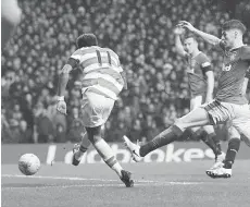  ??  ?? Scott Sinclair scores their second goal. — Reuters photo