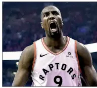  ?? AP/Canadian Press/FRANK GUNN ?? Toronto Raptors center Serge Ibaka celebrates after a basket against the Orlando Magic in Game 5 of their NBA playoff series Tuesday night in Toronto. The Raptors won to advance to the Eastern Conference semifinals.