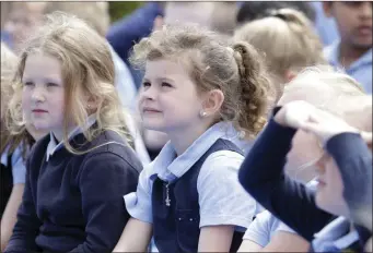  ??  ?? Layla Hamilton watching the flag be raised.