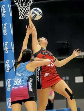  ??  ?? Steel goal keep Courtney Elliott puts pressure on Tactix goal shoot Ellie Bird during their clash in Invercargi­ll last night. ROBYN EDIE/STUFF