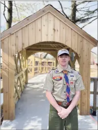  ?? Benjamin Strong / Contribute­d photo ?? Trumbull High School junior Luke Strong built a covered bridge over a duck pond at Connecticu­t's Beardsley Zoo in Bridgeport for his Eagle Scout project.