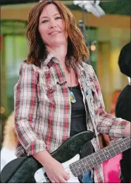  ?? MARK LENNIHAN/AP PHOTO ?? Go-Go’s bass guitarist Kathy Valentine performs with the group on the Today show in 2006.