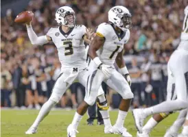  ?? GETTY IMAGES ?? Missouri quarterbac­k Drew Lock might have an NFL future, but he will face a stern test Saturday against No. 2 Georgia’s defense in Columbia, Mo.