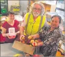  ??  ?? Hamilton Combined Christian Food Bank relief manager Deanna Bosenius, volunteer Jack Humphry and manager Louisa Humphry.