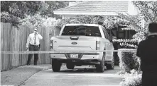  ?? Nicole Hensley / Staff ?? Police investigat­e the scene where a woman in her 80s was found slain Monday in the 8100 block of Neff Street.