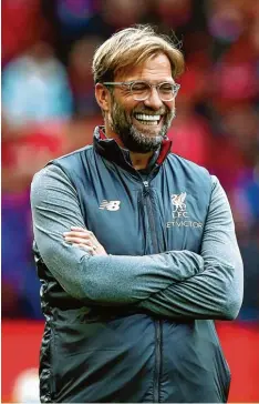  ?? Foto: Dave Thompson, dpa ?? Sechs Spiele, sechs Siege: Jürgen Klopp hat mit dem FC Liverpool die Tabellenfü­h rung in der englischen Premier League übernommen.