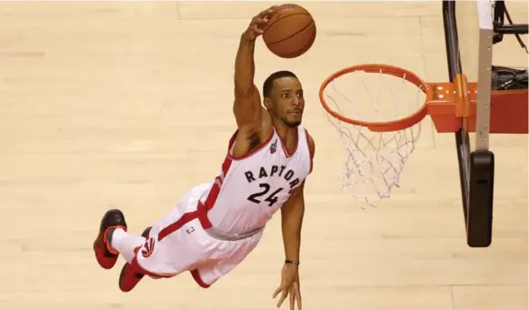  ?? RICK MADONIK/TORONTO STAR ?? Raptors’ Norman Powell lays down an emphatic dunk to tie the game against the Pacers at the Air Canada Centre on Tuesday night. The Raptors can clinch the series with a win Friday night.