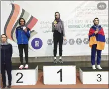  ?? KUNA photo ?? Silver medalist Madhawi Al-Shimmery, (left) on the podium with other winners.