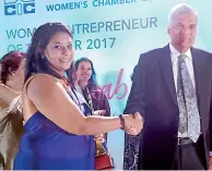  ??  ?? Quebee Den’s Founder and CEO receiving award from Prime Minister Ranil Wickremesi­nghe