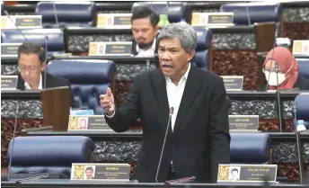  ?? — Bernama photo ?? Mohamad delivers his reply in Parliament.