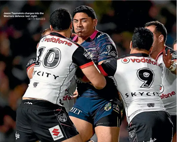  ??  ?? Jason Taumalolo charges into the Warriors defence last night.