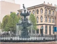  ??  ?? ROBERT RAUSCH FOR THE NEW YORK TIMES Court Square Fountain is near a former slave market.