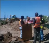  ??  ?? DESTROYED: Contractor­s damaged a community food garden which was built by Manenberg residents.