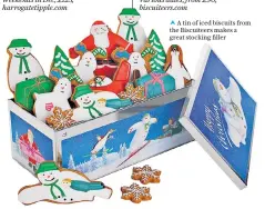  ?? ?? A tin of iced biscuits from the Biscuiteer­s makes a great stocking filler