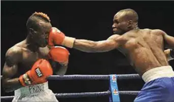  ??  ?? Otto Boy Joseph lands a killer punch on his opponent during one of the GOtv Boxing Nights