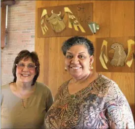  ?? RICHARD PAYERCHIN — THE MORNING JOURNAL ?? Playwright Kelly Boyer Sagert, left, and actress Debra Rose stand for a photo at Heritage Presbyteri­an Church, 515 N. Leavitt Road, Amherst. The church will host Sagert’s play, “Bound Together: One Great Bundle of Humanity,” about 19th Century author...