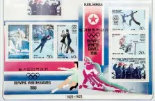  ?? ?? A selection of stamps commemorat­ing N.Korea's participat­ion in past winter Olympic Games is displayed at a stamp shop in Pyongyang. AFP / Ed Jones