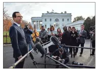  ?? / AP-Evan Vucci ?? Treasury Secretary Steve Mnuchin talks with reporters about trade negotiatio­ns with China at the White House on Monday.