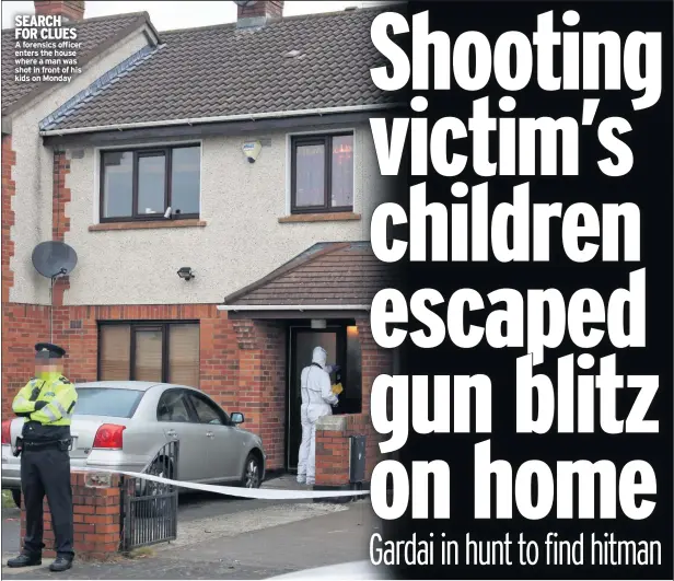  ??  ?? SEARCH FOR CLUES A forensics officer enters the house where a man was shot in front of his kids on Monday