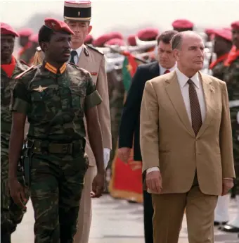  ??  ?? Thomas Sankara, president of Burkina Faso, and French president François Mitterrand, Ouagadougo­u, November 1986