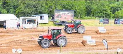  ?? Photo / Kate Durie Photo / Supplied ?? A Fieldays first — a tractor racing experience that put visitors into the driver’s seat.
From left: Neil Bateup (RST) Janine Peters (Ag Drive) Peter Peter Nation (NZNFS).