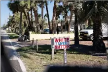  ?? ?? A local yard sign expresses white-supremacis­t sympathies.