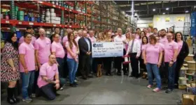  ?? SUBMITTED PHOTO ?? Allied Wire & Cable recently donated $50,000 to the National Breast Cancer Foundation. Most of the money was raised during a week-long fundraiser. Shown here are Allied Wire & Cable employees with representa­tives from the National Breast Cancer...