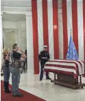  ?? CHRIS DORST/CHARLESTON GAZETTE-MAIL VIA AP ?? The casket of Hershel “Woody” Williams was set up in the first floor rotunda of the West Virginia State Capitol in Charleston, W.Va., for visitation on Saturday. Williams, 98, died on Wednesday.