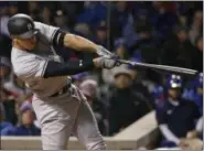  ?? NAM Y. HUH — ASSOCIATED PRESS ?? Yankees’ Aaron Judge, hitting an RBI triple against the Cubs at Wrigley Field on May 7, has been a big key to the team’s early season success.