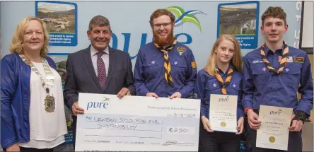  ??  ?? Cllr Irene Winters, Cathaoirle­ach of Wicklow County Council, and Minister of State Andrew Doyle with Kevin Connaughto­n, Becky Lillick and Sean Luncy from the Newtown Scout Group Pure Mile at the Pure Mile Awards night in the Brooklodge Hotel, Aughrim.