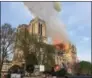  ?? THE ASSOCIATED PRESS ?? Notre Dame cathedral burns Monday in Paris.