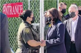  ?? SARAHBETH MANEY/THE NEW YORK TIMES ?? Chief Patrol Agent Gloria Chavez shakes hands with Vice President Kamala Harris on Friday at the border’s El Paso Station in Texas.