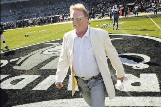  ?? THOR SWIFT/SPECIAL TO THE LAS VEGAS REVIEW-JOURNAL ?? Oakland Raiders owner Mark Davis makes his usual pregame rounds, chatting with players and coaches before a 38-24 victory over the Buffalo Bills on Dec. 4 at Oakland-Alameda Coliseum. “(My father) said I was going to have a hard time running this team...