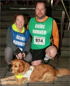  ??  ?? Yvonne Weavers with her guide dog ‘Macy’ and guide runner Gareth Mitchell.