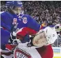  ?? BRUCE BENNETT/GETTY IMAGES ?? New York’s Ryan McDonagh smashed Montreal’s Brendan Gallagher Sunday.